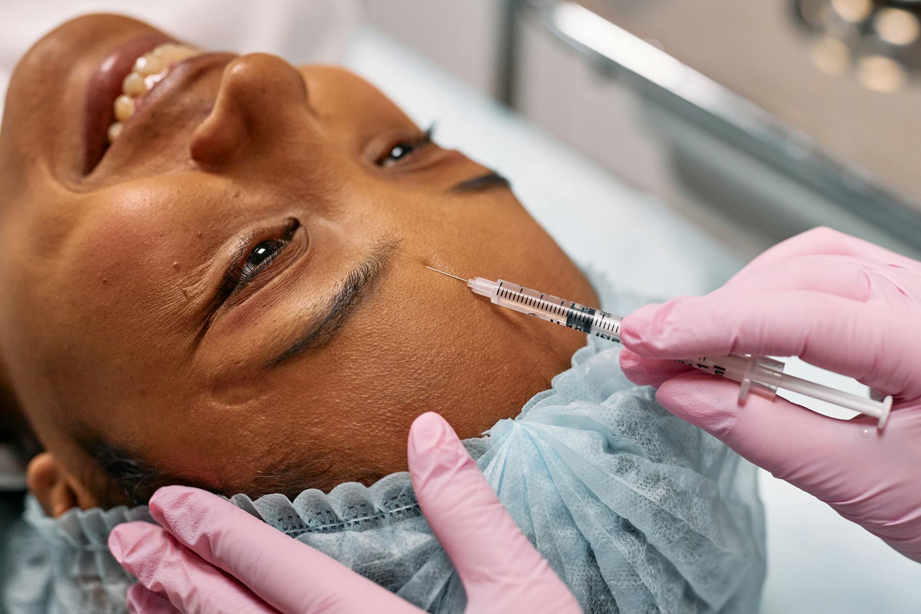 woman getting a forehead botox